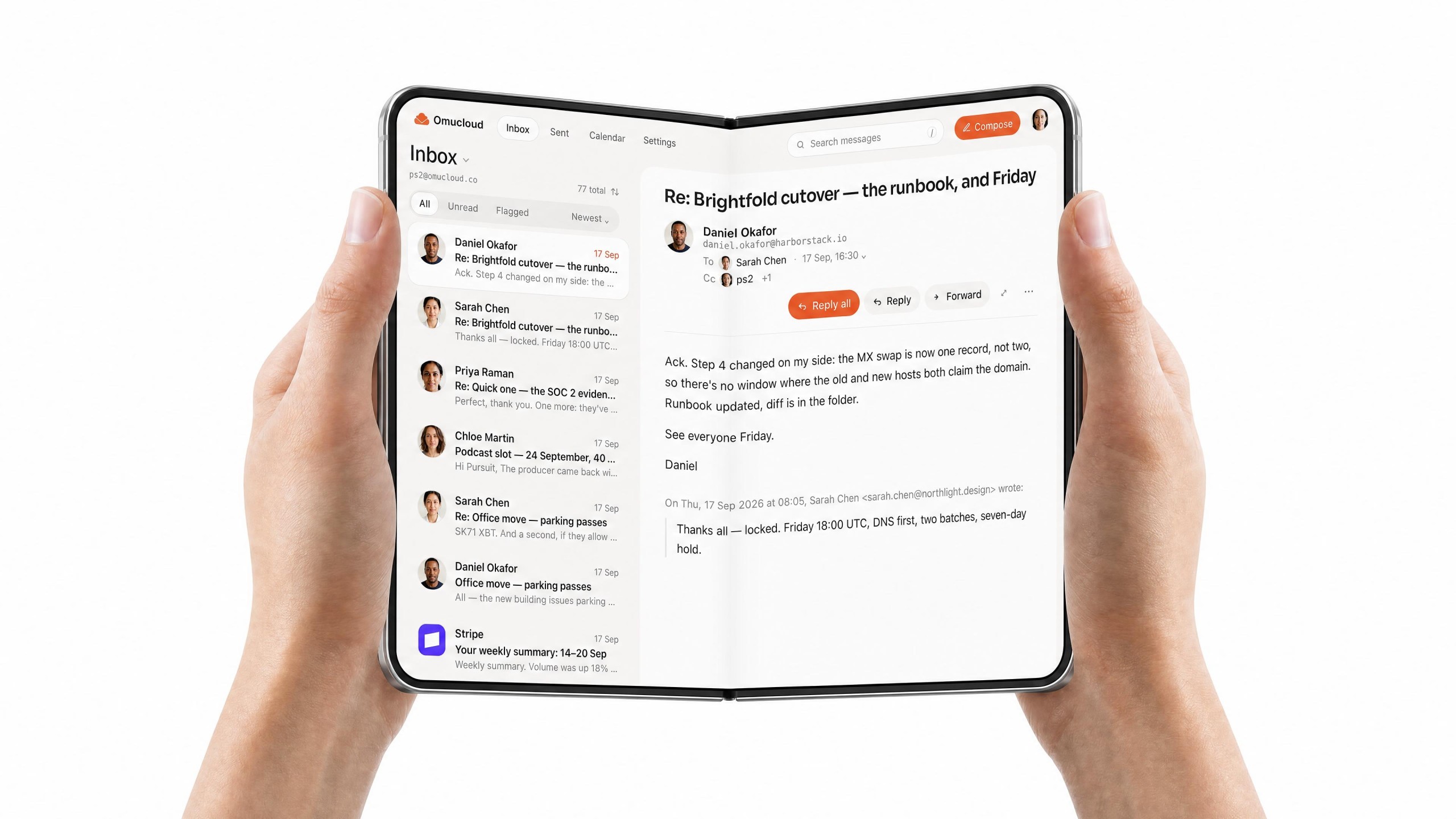 An iPhone Duo open on a desk, the inbox list on the left pane and a letter on the right